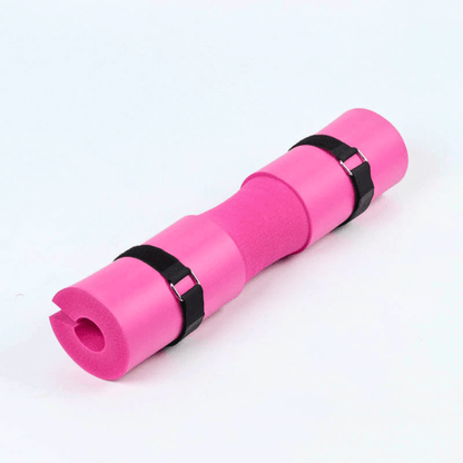 Barbell pad in vibrant pink color designed for comfort during squats, hip thrusts, and weightlifting.